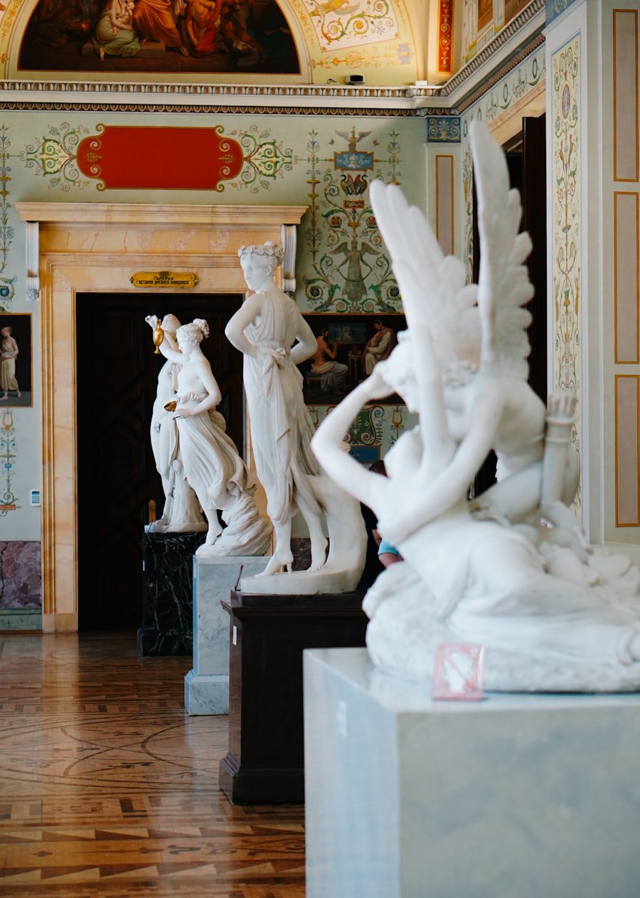 Classical sculptures and busts in gallery room